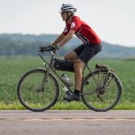 Person riding a bicycle on a road