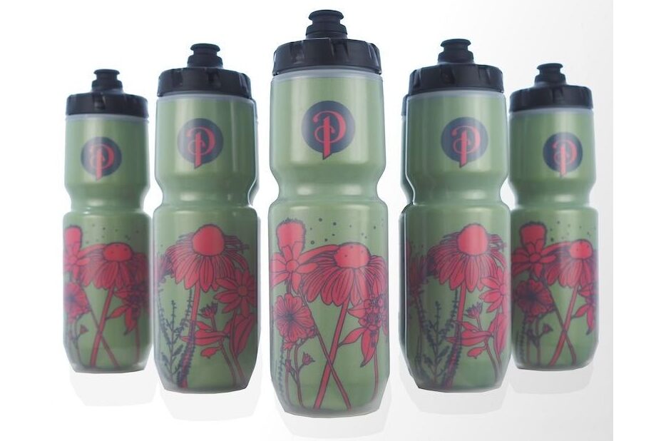 Bicycle water bottles lined up.